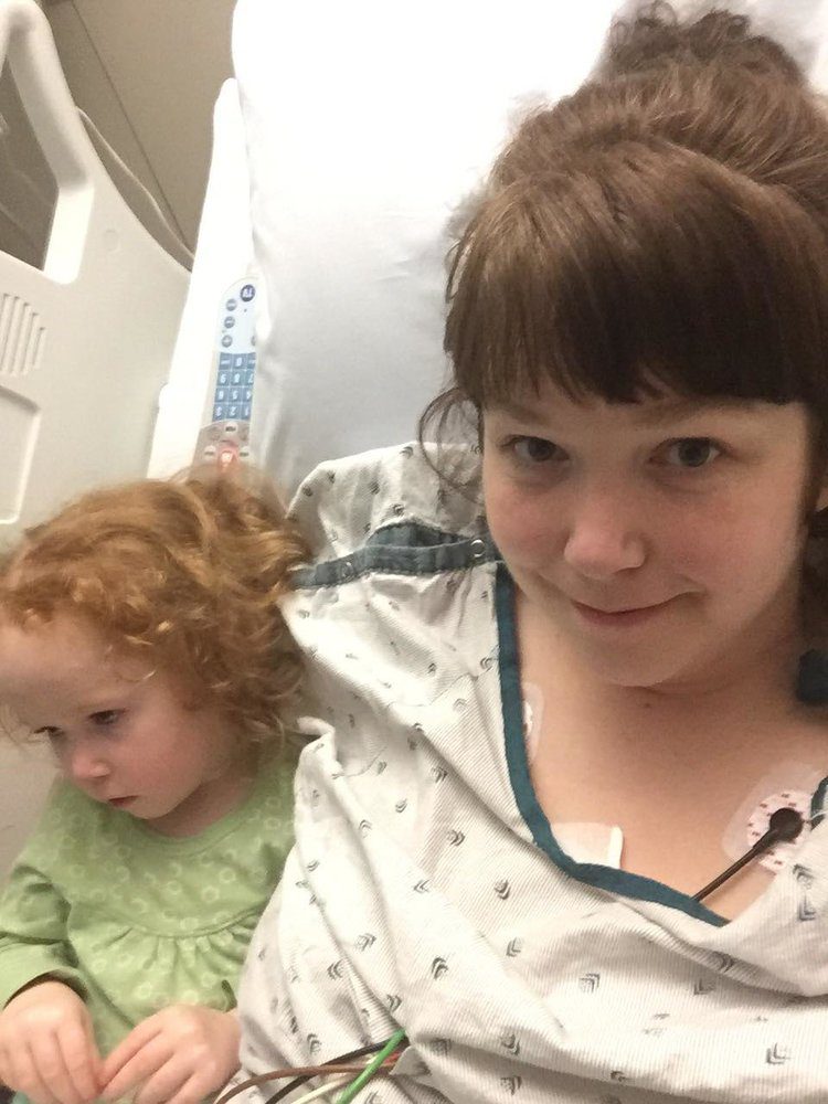 Dana and her daughter Claire in the hospital on Christmas